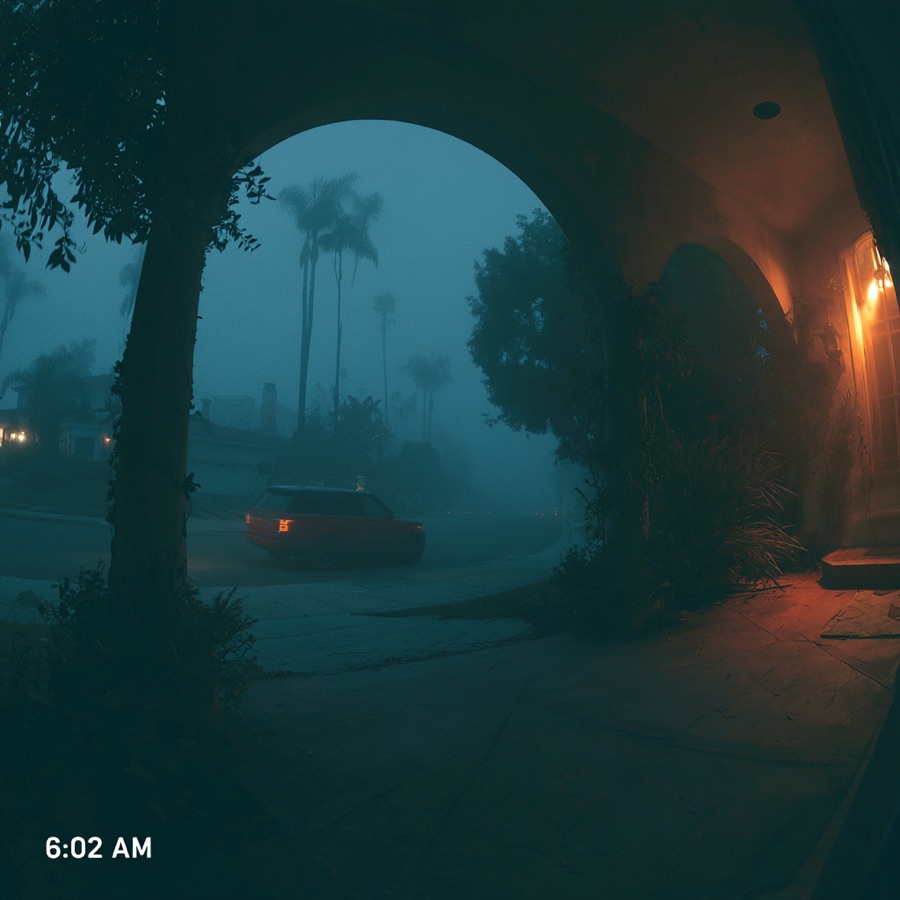 Doorbell camera still: a car pulling out of a driveway before dawn